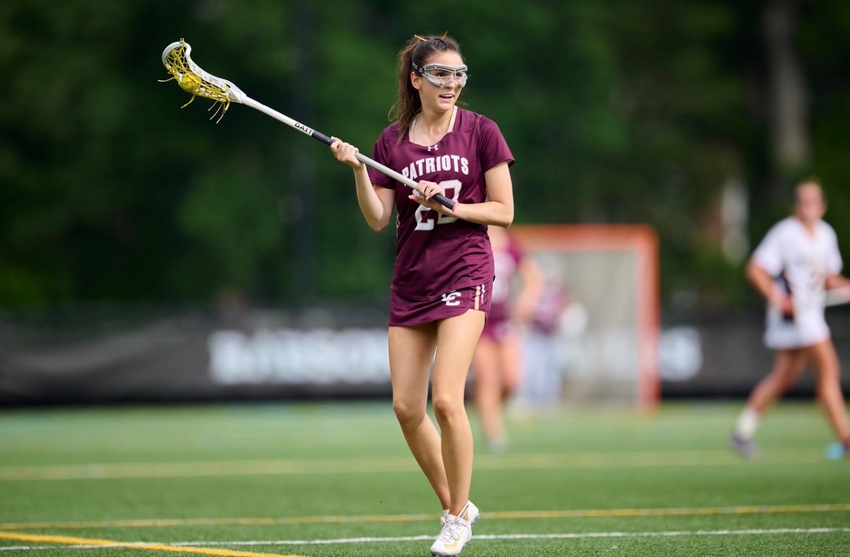 Vivi playing lacrosse for Concord-Carlisle