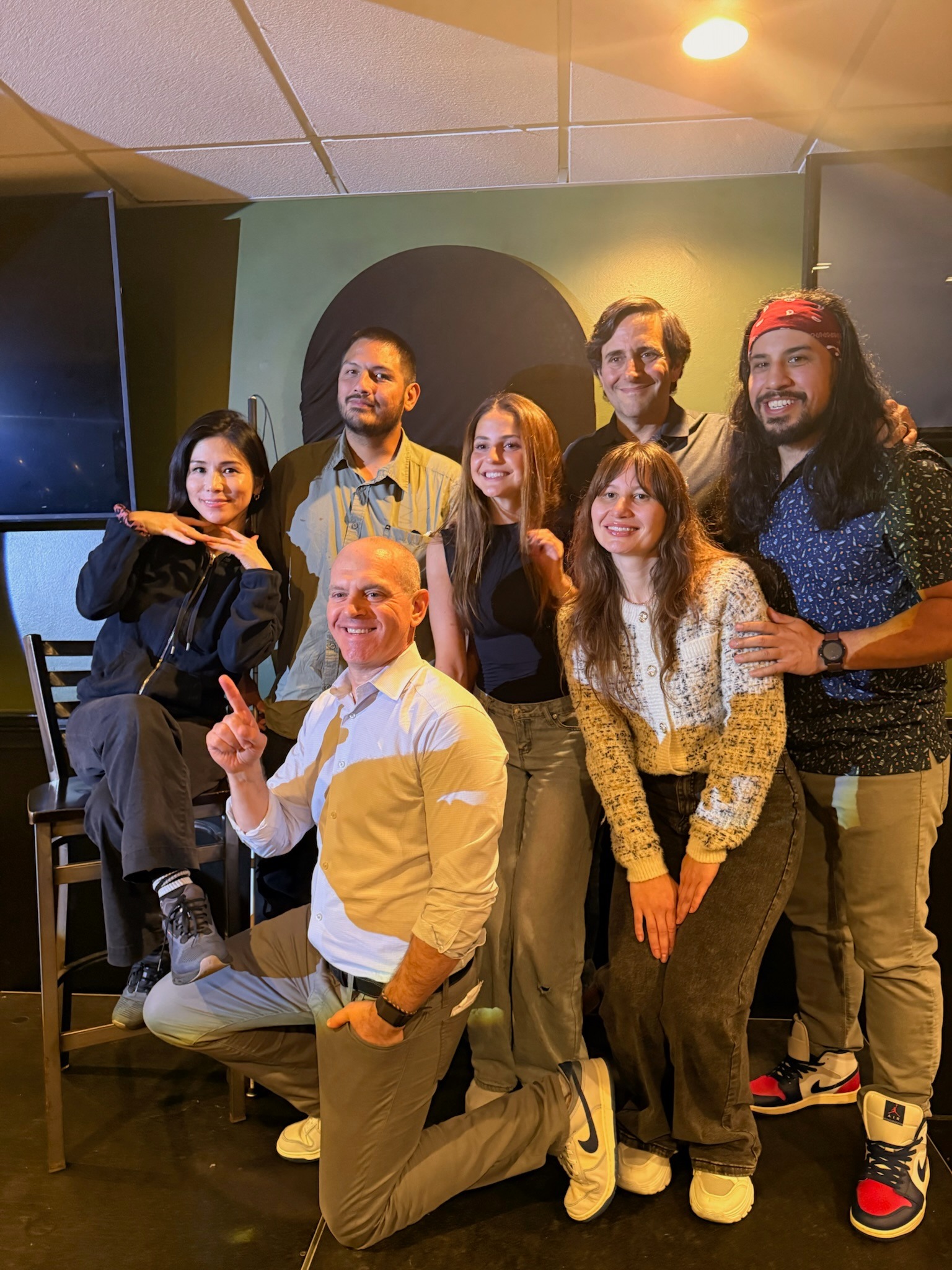 Vivi with performers at the Stand Up for Good fundraiser